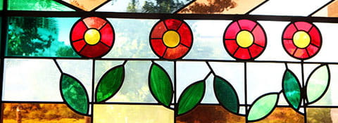 Stained glass window with flowers.